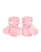 Misty Rose, a Pink knitted baby booties with pom-poms on a white background