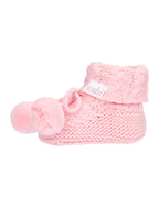 Misty Rose, a Pink knitted baby booties with pom-poms on a white background