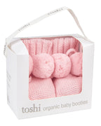 Box of Misty Rose, a pink organic baby booties on a packaging with a white background.