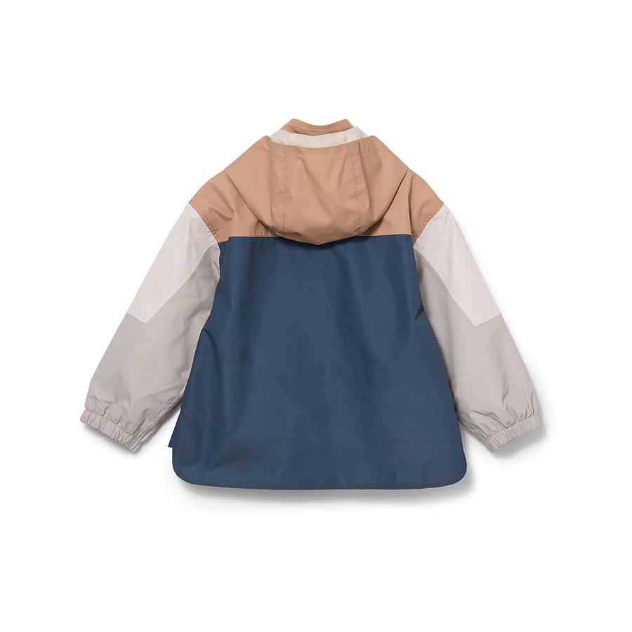 Back view of a color-blocked kids' jacket featuring a tan hood, light gray sleeves, and a deep navy blue lower body.