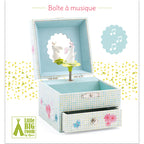 Music Box Sweet Rabbits Song , a Light blue and yellow crosshatch-patterned musical jewelry box featuring a spinning white bunny figurine, a scalloped mirror, a soft blue interior lining, and pink floral accents on a pull-out bottom drawer.
