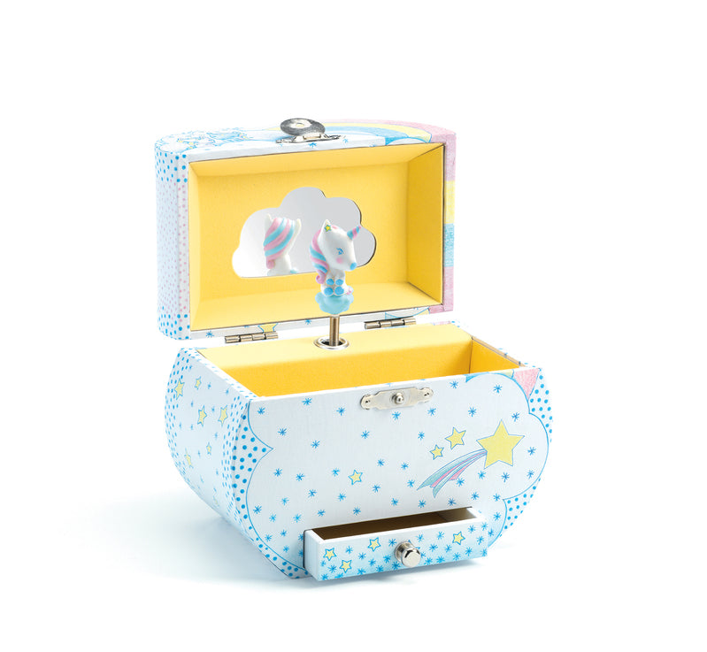 Open pastel blue children's music box decorated with yellow stars and white dots, featuring a yellow-lined interior, cloud-shaped vanity mirror, and a white unicorn figurine with a pink and blue mane.