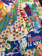 A close-up of a colorful printed fabric of Sweet SoulPrint.