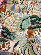 A close-up of the MilaMeli Byron Pant Agave Greens fabric.