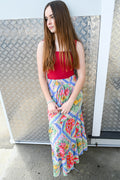 A young woman with long brown hair waearing aeve Maxi Skirt Butterfly Patch Print.