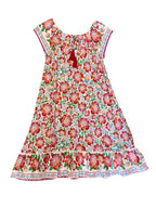 Floral dress featuring Fiesta Bloom print, a white base with a vibrant floral pattern in red, orange, green, and blue.
