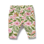 Floral patterned pants on a white background