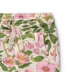 Floral patterned pants with a white drawstring on a white background