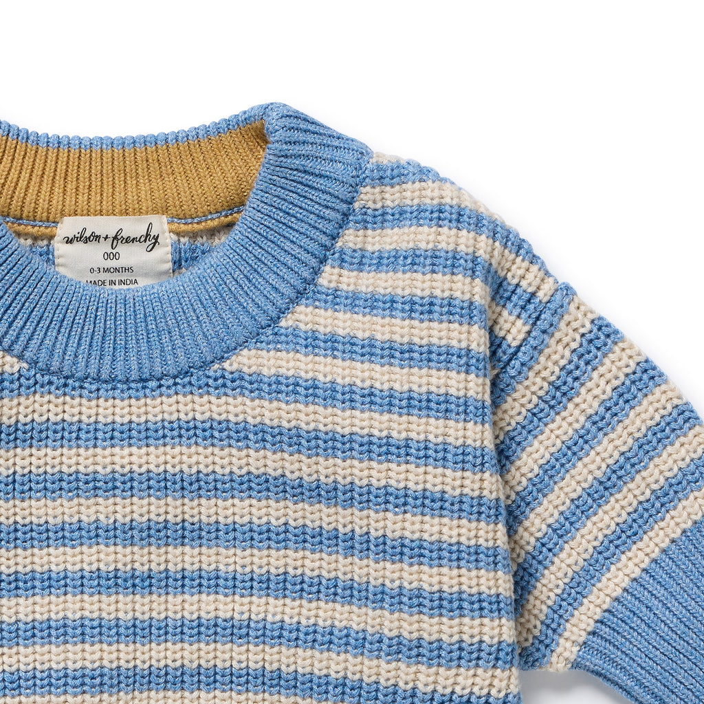 Close-up of Wilson & Frenchy Organic Knitted Stripe Jumper, a Blue and beige striped sweater on a white background.