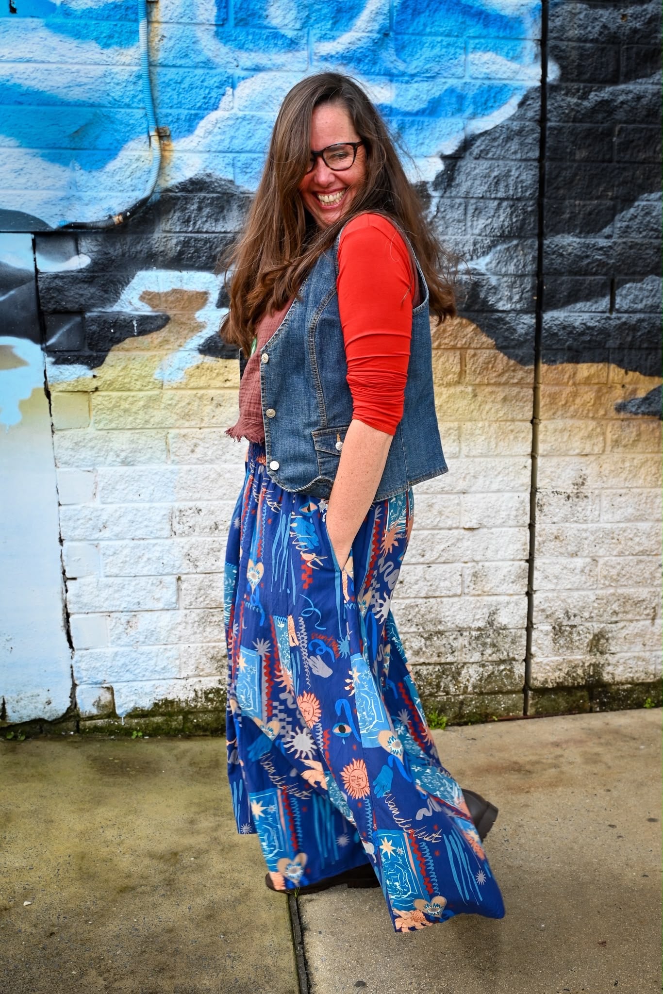 A woman wearing a Byron Pant Wanderlust Navy.