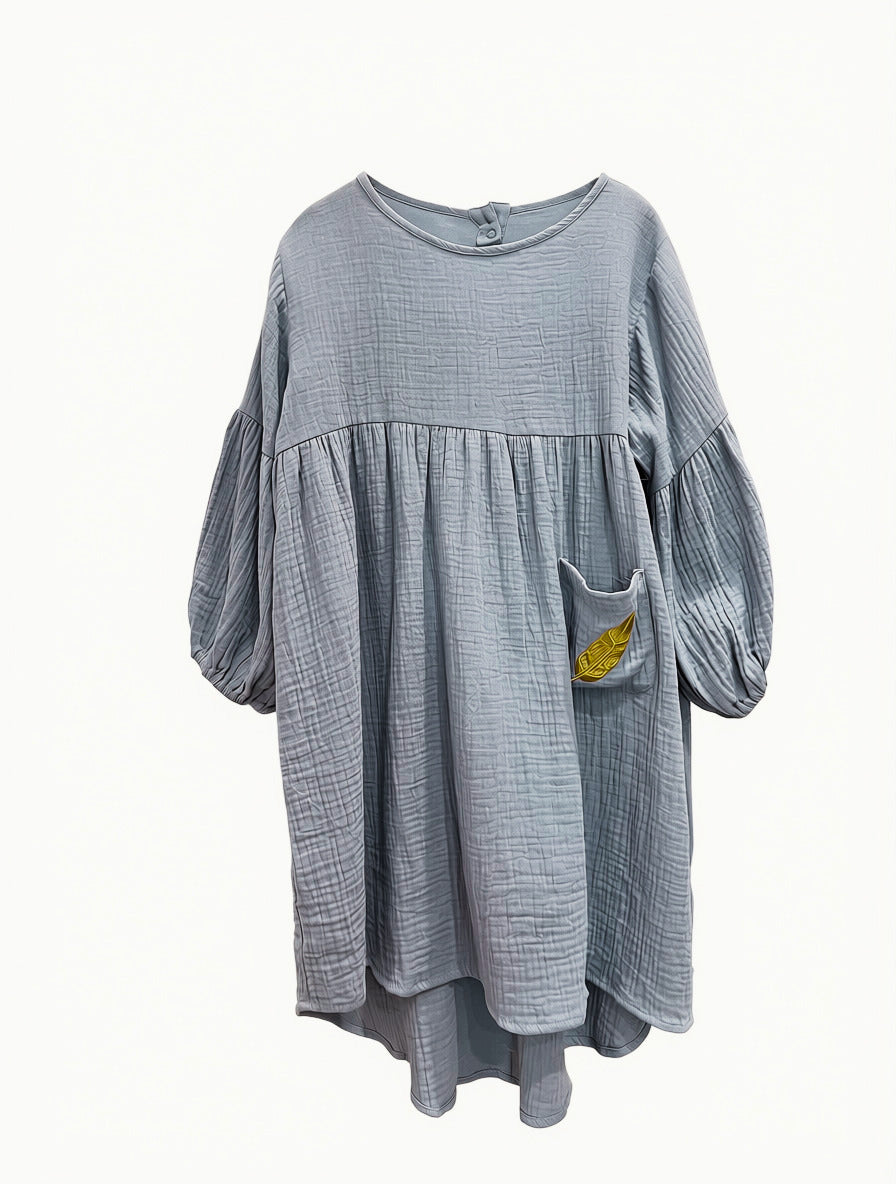 Evie Dress Periwinkle Muslin Cotton in white background.