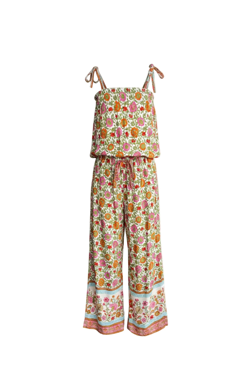 Sleeveless children's jumpsuit featuring Festival Garden print, a white base with an all-over floral pattern of orange, pink, and green. Complete with tie shoulder straps and a drawstring waist.